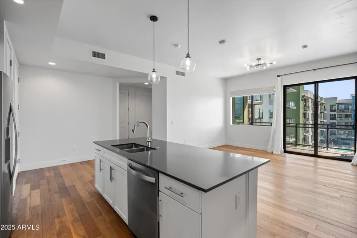 Kitchen looking out to Living Room/Balcony