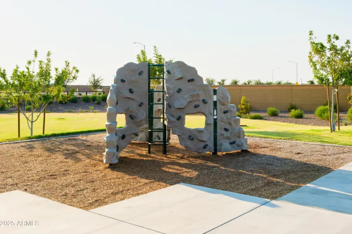 PLAY PARK WITH ROCK CLIMBING, SWINGS, CORN HOLE AND PICNIC AREAS