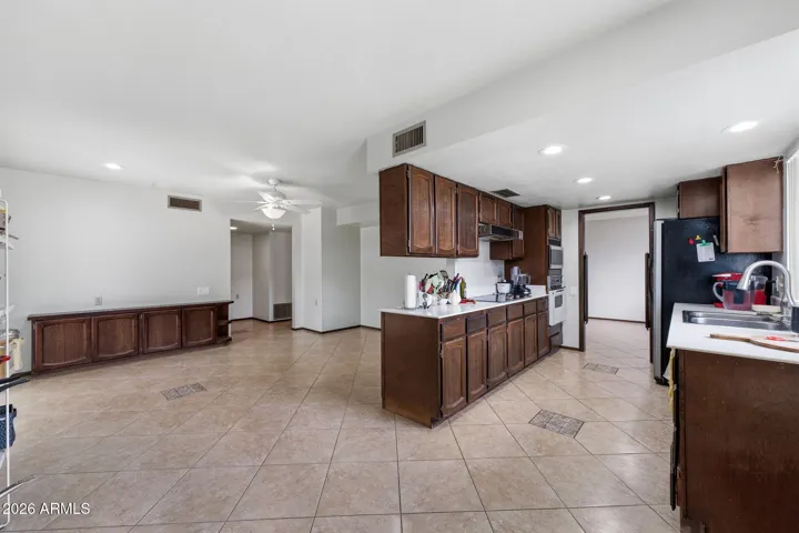 GALLEY STYLE KITCHEN WITH BUILT IN APPIANCES