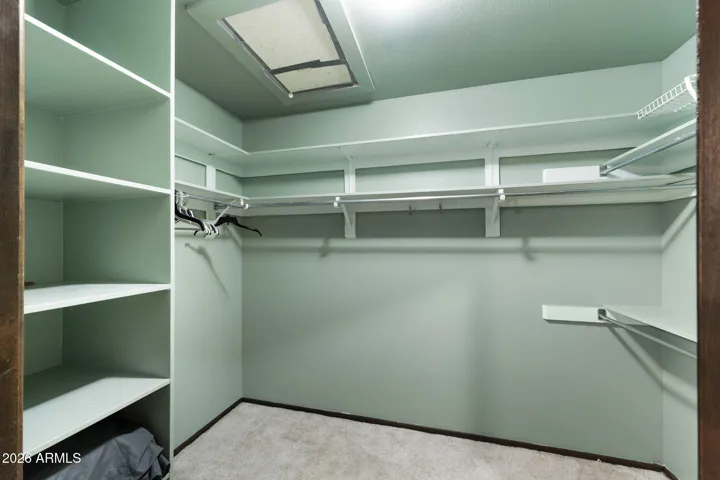 LARGE PRIMARY WALK-IN CLOSET