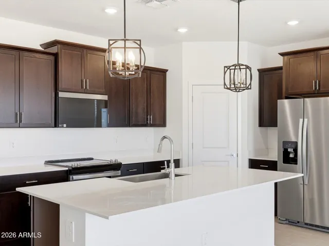 Photo is not of the actual home. Interior finishes and fixtures may vary.