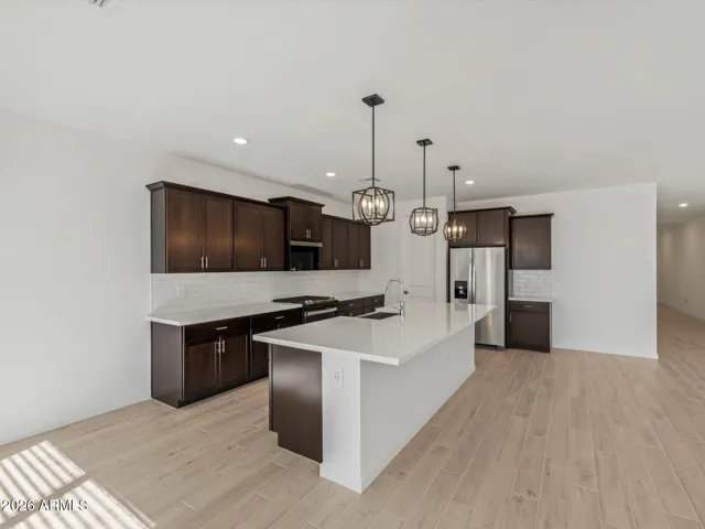 Photo is not of the actual home. Interior finishes and fixtures may vary.