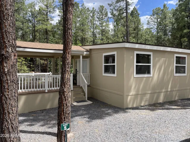 Park Model with Room Addition and Deck with Views