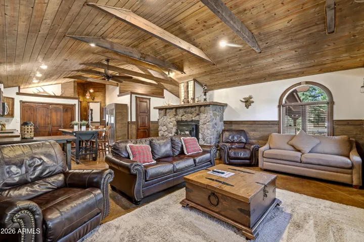 Spacious living area flowing into the kitchen and dining space, perfect for entertaining.