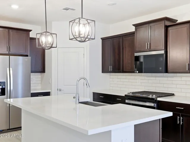 Photo is not of the actual home. Interior finishes and fixtures may vary.