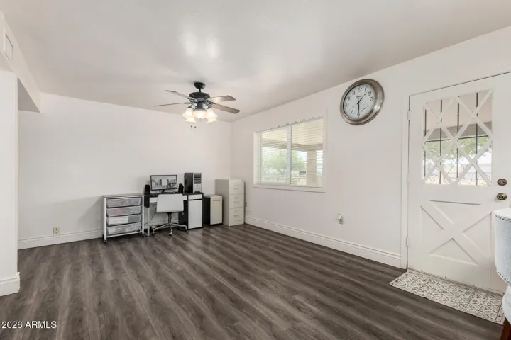 Kitchen dining area with door to back patio