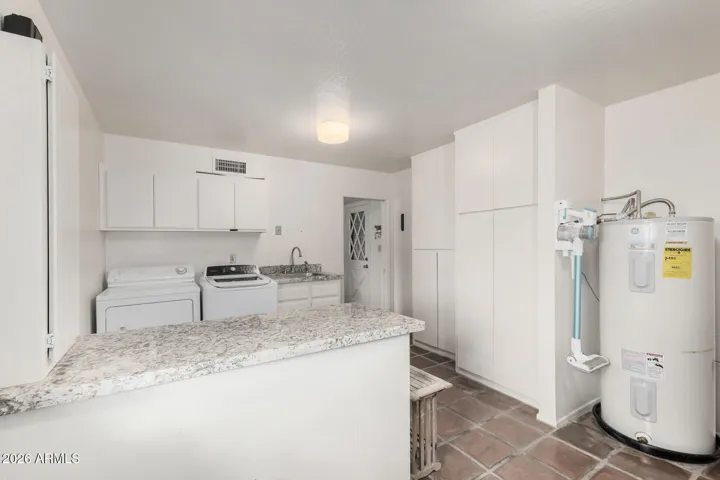 Huge Laundry/Mud Room with ample storage and newer water heater