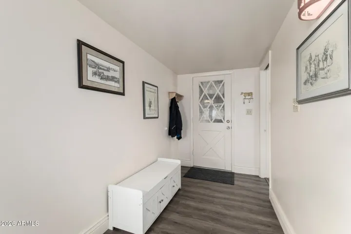 Garage entry door to home that gives access to laundry room/mud room and kitchen