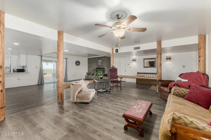 Family Room view showing designer peeled poles