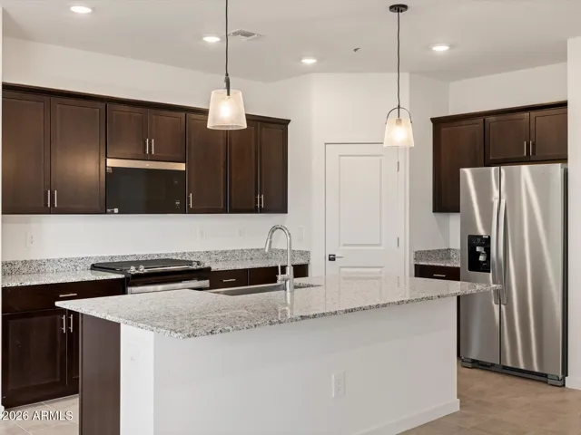 Photo is not of the actual home. Interior finishes and fixtures may vary.