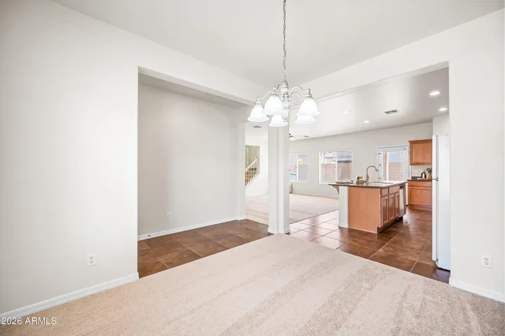 Living, dining, and kitchen connect for optimal utility