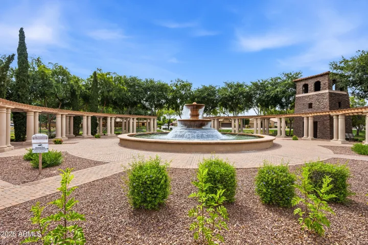 Enjoy the charm of this beautifully maintained community gathering space, complete with a stunning tiered fountain, shaded pergola walkways, brick pavers, benches, and lush green areas. It’s the perfect neighborhood setting for morning walks, quiet evenings, or simply enjoying the outdoors close to home.