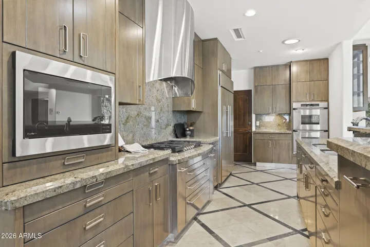 AMPLE KITCHEN STORAGE AND WALK IN PANTRY