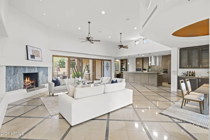 FRONT ENTRY LOOKING INTO LIVING ROOM AND KITCHEN