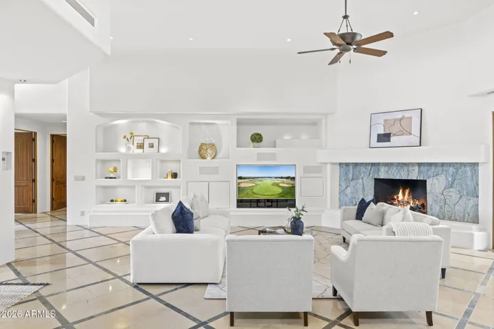 LARGE LIVING ROOM FILLED WITH NATURAL LIGHT