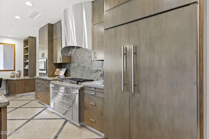 LARGE FRIDGE AND STAINLESS STEEL GAS COOKTOP