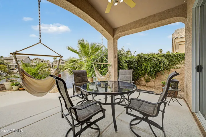 The covered patio for lunch and two swing chairs for a good book.