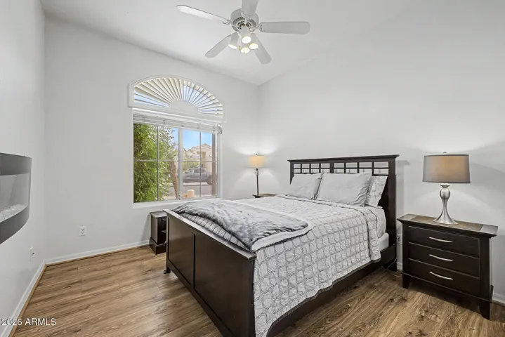 Guest bedroom with its own wall fireplace, privacy with a front room view.