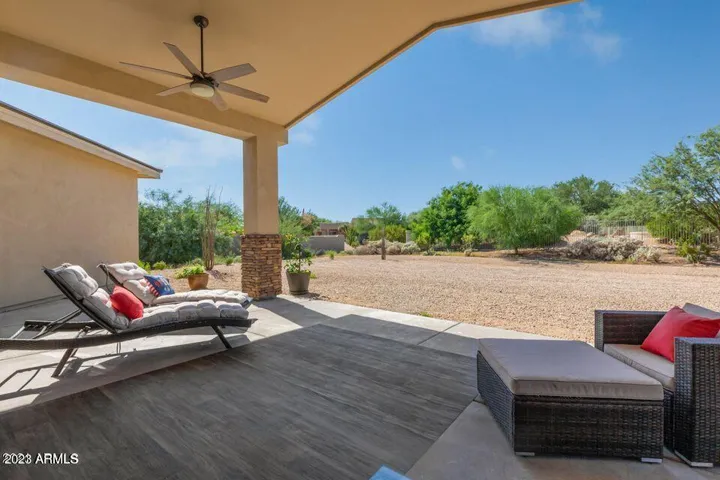 Large covered outdoor patio with 16' sliding door