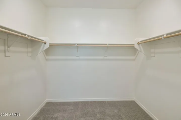 DUAL VANITIES, TUB, SHOWER LOTS OF STORAGE AND LARGE WALK IN CLOSET.