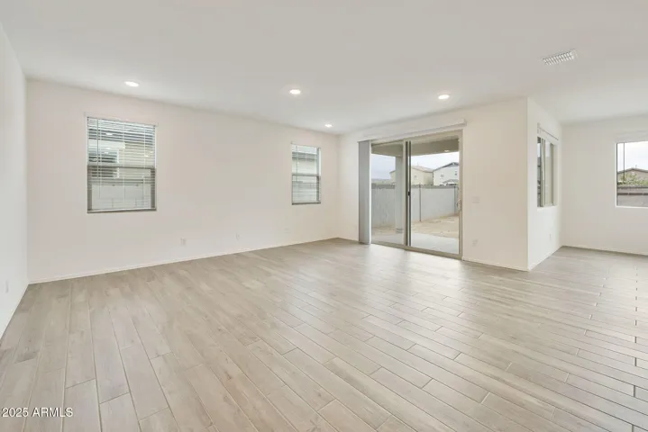 SEEMLESS WOOD PLANK TILE FLOORING DOWNSTAIRS MINUS THE BEDROOMS
