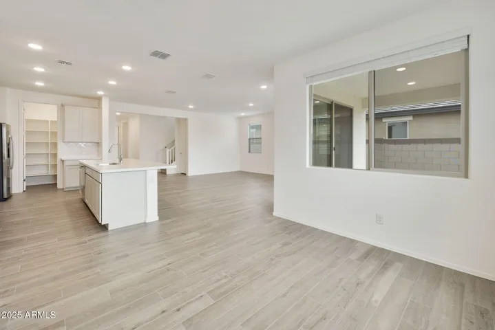 SEEMLESS WOOD PLANK TILE FLOORING DOWNSTAIRS MINUS THE BEDROOMS