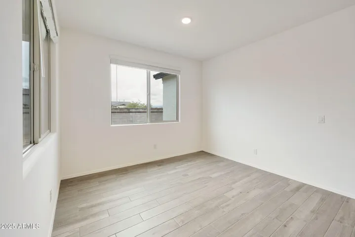 SEEMLESS WOOD PLANK TILE FLOORING DOWNSTAIRS MINUS THE BEDROOMS