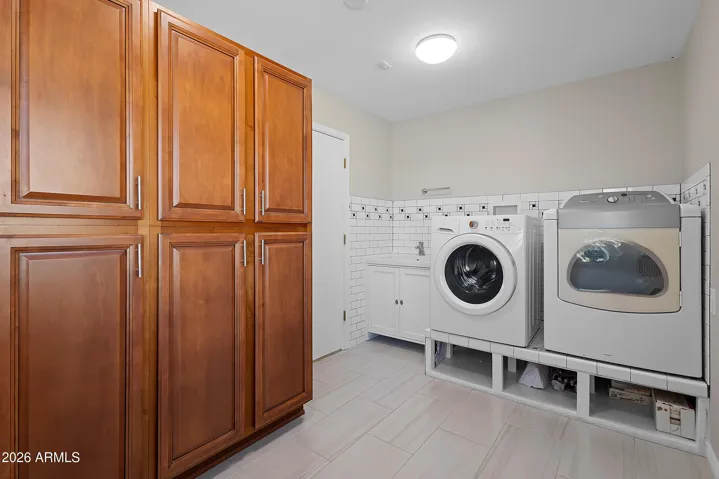 Dedicated laundry space with storage