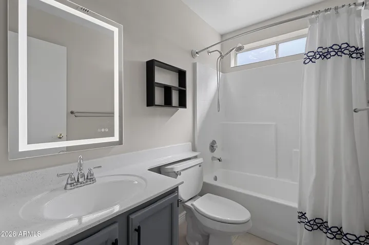 Full bathroom with clean finishes