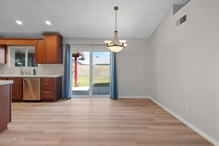 Dining area with backyard access—perfect for indoor-outdoor living.