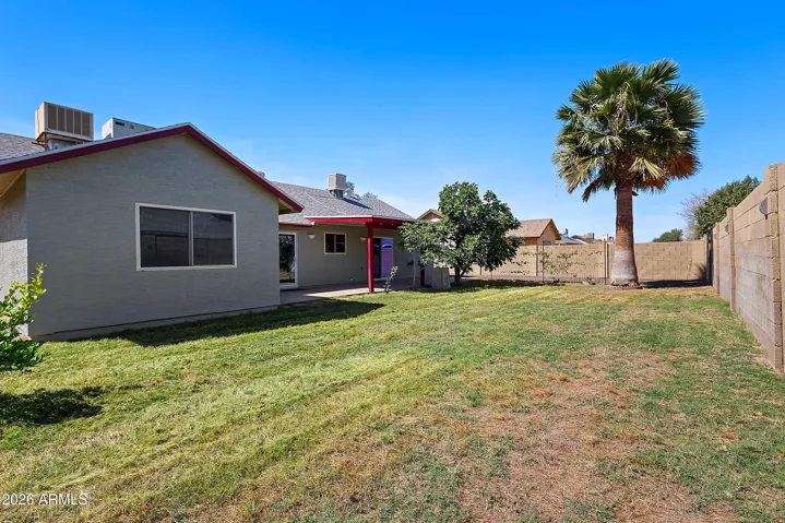 Create your dream outdoor retreat in this large backyard