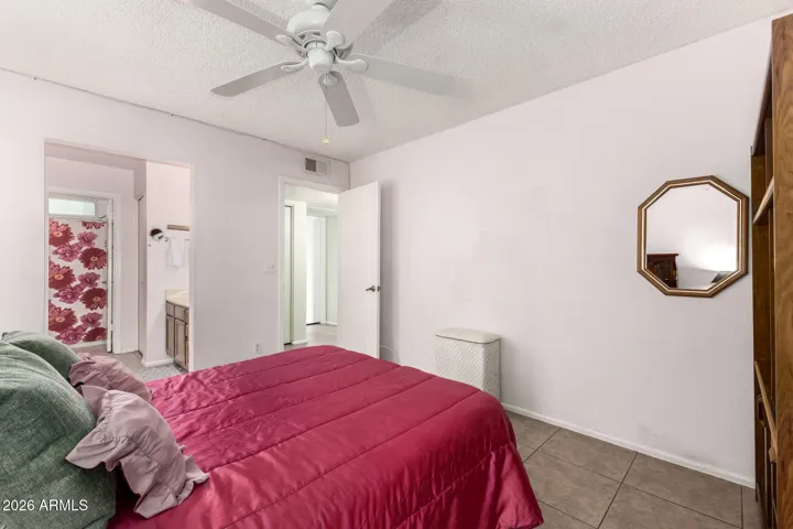 Large Master Bedroom that Peaceful and Quiet Looking into Master Bathroom