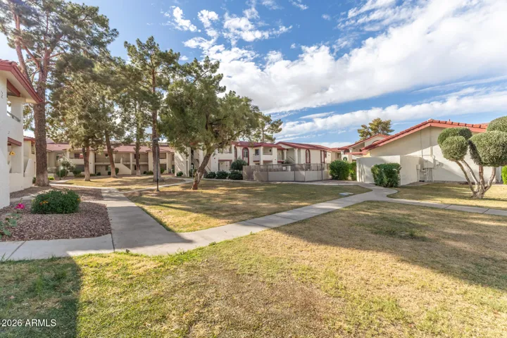 Walking Paths and Grass By Main Pool Up Front