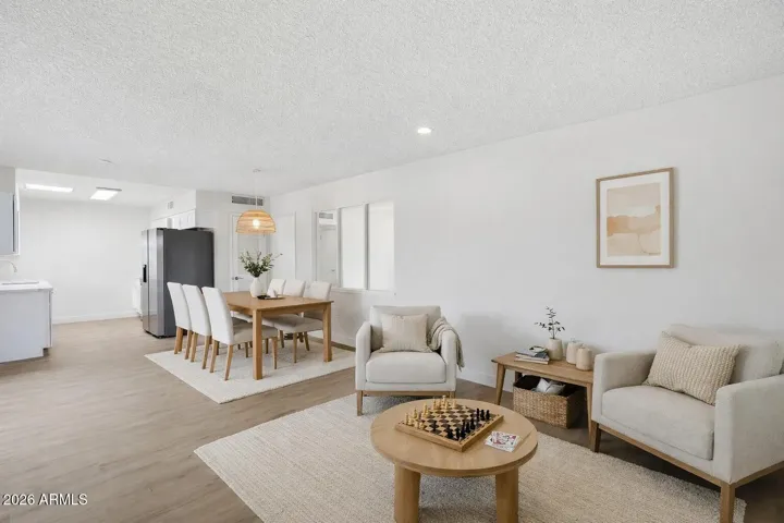 Dining + Great Room virtually staged - (off of the kitchen)