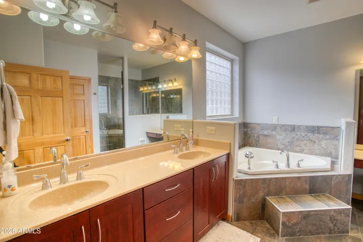 Primary Bathroom - Dual Vanity & Large Tub