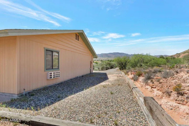 RV parking on side of house