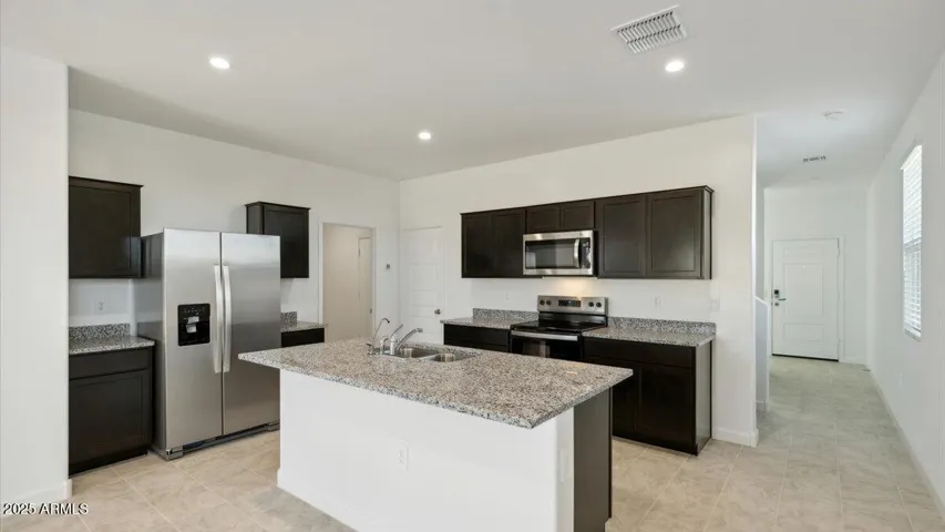 Photos are of a spec and may vary in color, interior selections and design