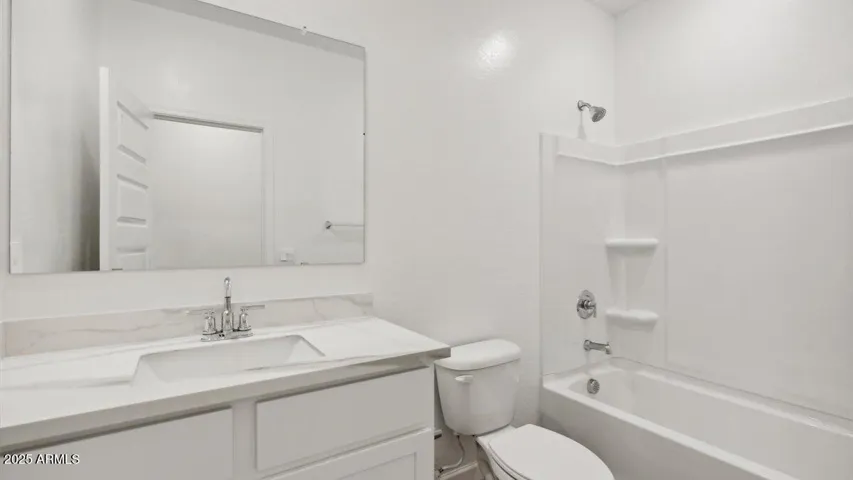 Photos are of a spec and may vary in color, interior selections and design