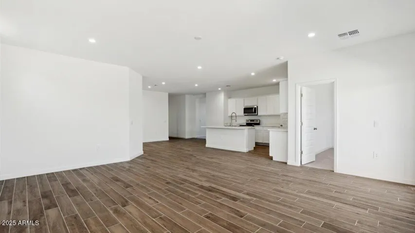 Photos are of a spec and may vary in color, interior selections and design
