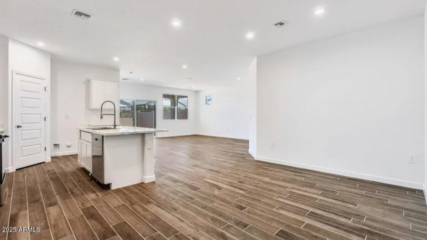 Photos are of a spec and may vary in color, interior selections and design