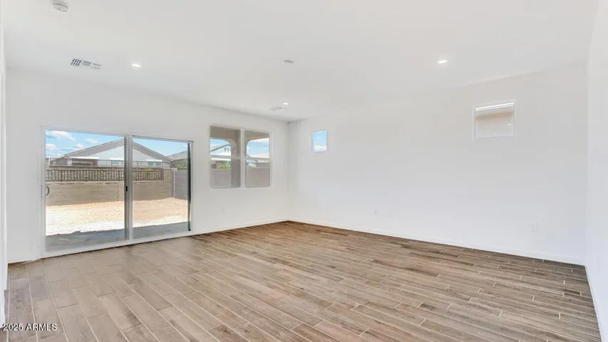 Photos are of a spec and may vary in color, interior selections and design