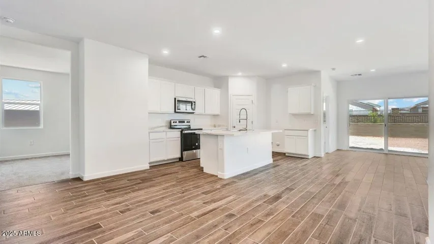Photos are of a spec and may vary in color, interior selections and design