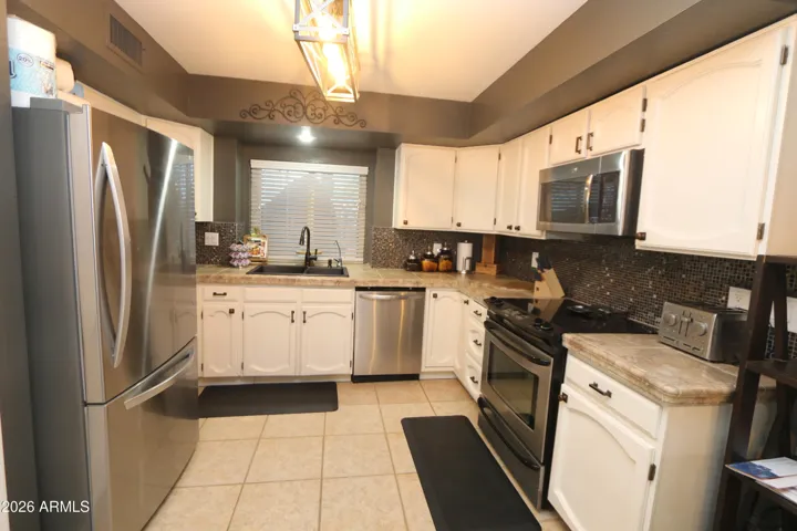 Lots of room for the chef to cook delicious meals. Great storage and pantry.