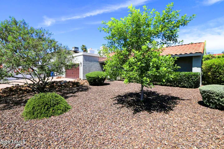Simple and stunning low and easy maintenance front landscape.