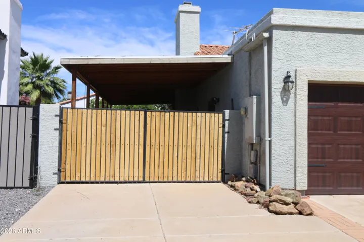 Double RV gates to covered RV, Boat or what ever you would like to park here. You could also use it as extended patio space.