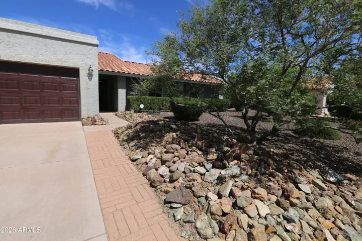 Welcoming Paver walkway to front door.