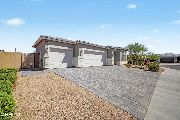 NORTH SIDE GATE AND PAVER DRIVEWAY