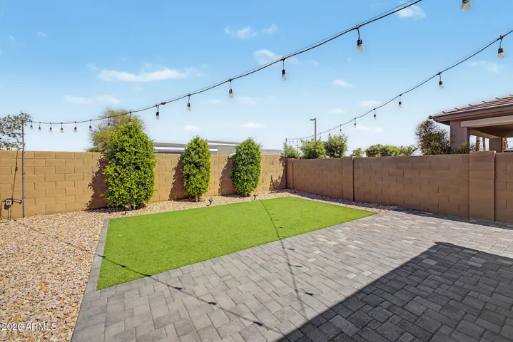 LOW MAINTENACE BACKYARD WITH PAVERS AND TURF
