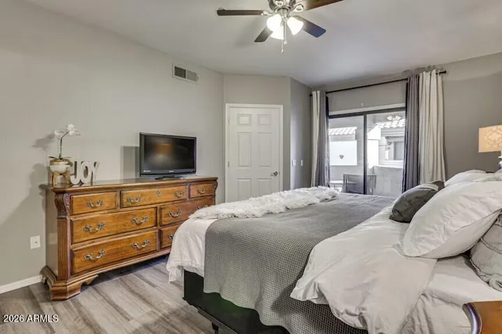With sliding doors to balcony!