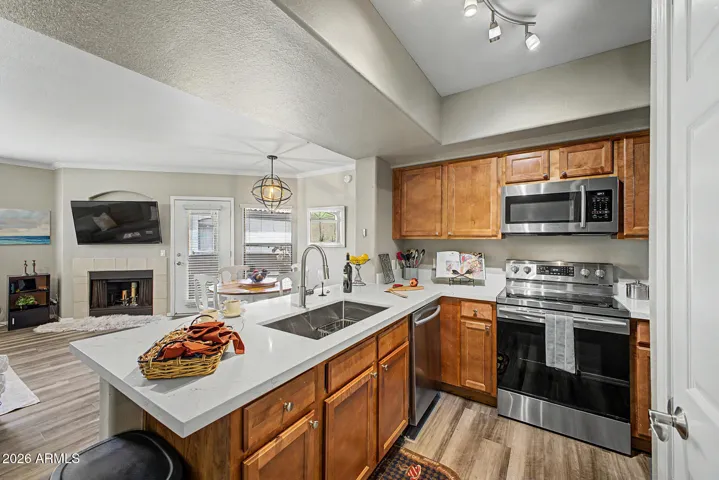 PLUS NEW Sink, faucet, Stainless steel appliances! No OLD raised bar countertop! And a pantry!